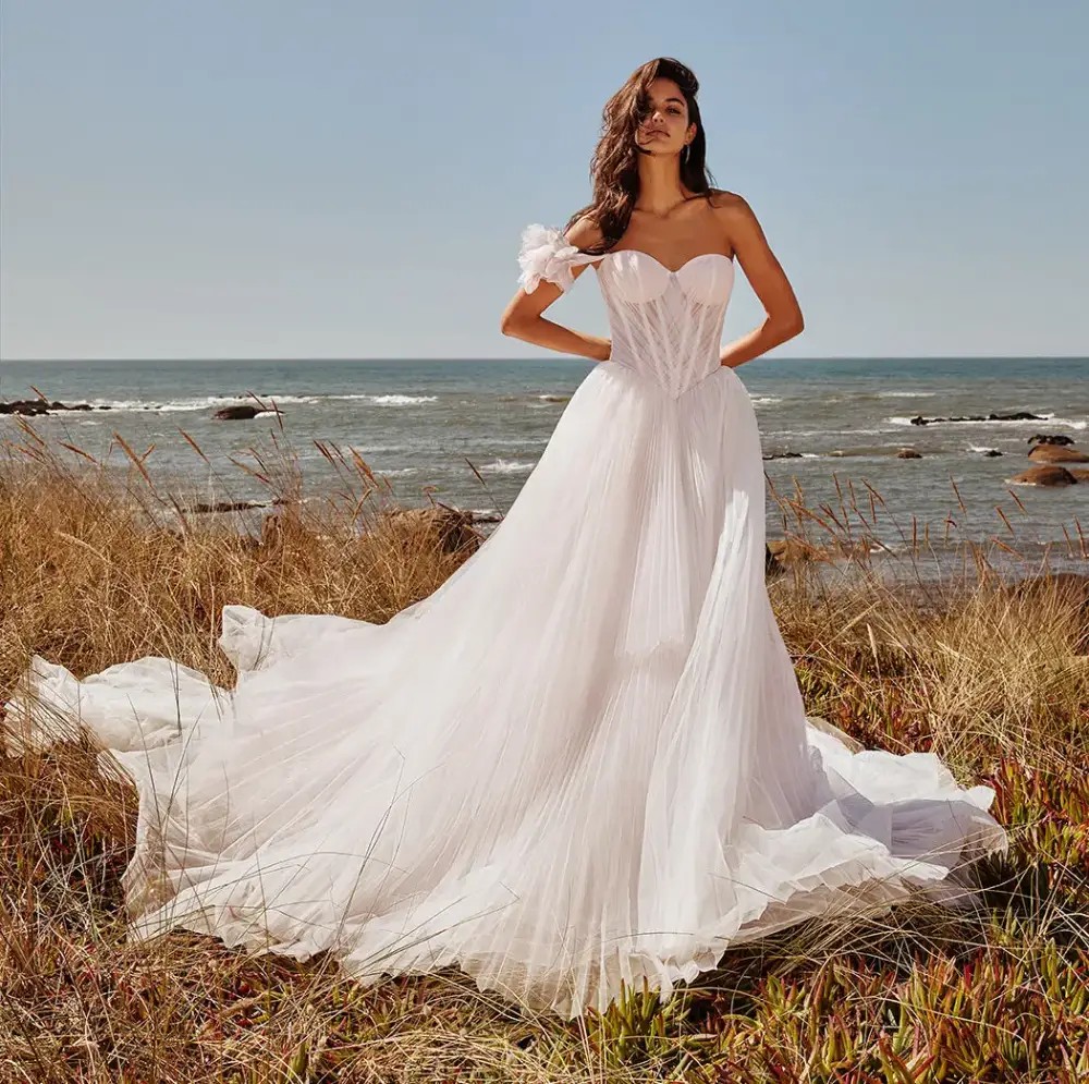 Model wearing a white gown